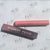 Pink F*ckboy-Proof Lash Tack tube beside its box on A’Lei Beauty branded paper