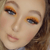 Streamer Heat eyeshadow palette orange eyeshadow on blue eyes, blonde hair - A’Lei Beauty black owned